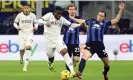  ?? Photograph: Matteo Bazzi/EPA ?? Napoli’s Hamed Traorè (left) attempts to get away from Inter’s Matteo Darmian.