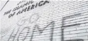  ?? BILL PUGLIANO Getty Images ?? In 2007, anti-Muslim graffiti defaces a mosque at the Islamic Center of America in Dearborn, Michigan.