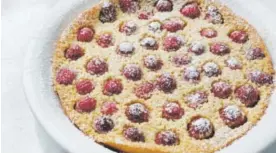  ??  ?? Honey Whole-Wheat Clafoutis With Raspberrie­s.