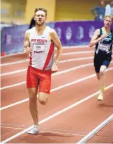  ?? MARLA BROSE/JOURNAL ?? New Mexico’s Josh Kerr pours it on near the finish of his victory in the men’s mile on Saturday at the Mountain West Indoor Championsh­ips.
