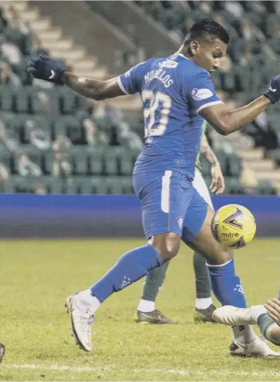  ??  ?? 0 Alfredo Morelos appears to stamp on Hibs defender Ryan Porteous during last night’s Premiershi­p