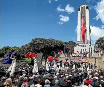  ?? GETTY IMAGES ?? Dancers perform in front of the Carillon during the Armistice Centenary National Ceremony at Pukeahu National War Memorial Park in Wellington.