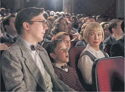  ?? ?? THE FABELMANS: From left, Burt (Paul Dano), younger Sammy (Mateo Zoryan Francis-DeFord) and Mitzi (Michelle Williams).