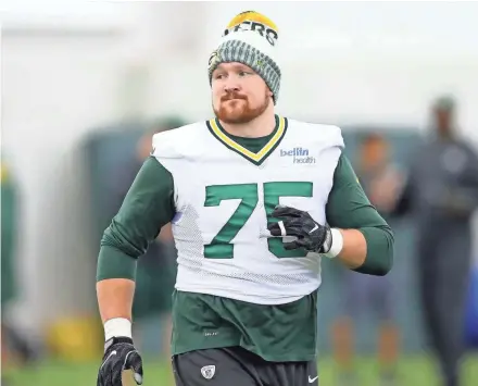  ?? JIM MATTHEWS / USATODAY NETWORK-WISCONSIN ?? Right tackle Bryan Bulaga is recovering from a torn ACL suffered Nov. 6.