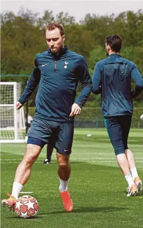  ??  ?? Christian Eriksen (left) trains at Tottenham Hotspur’s Enfield Training Centre yesterday. AFP PIC