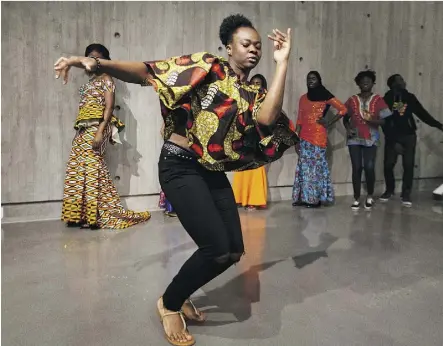 ?? PHOTOS:IAN KUCERAK ?? Ashley Ezekpo dances at press event for Africaniva­l at MacEwan University on Friday.