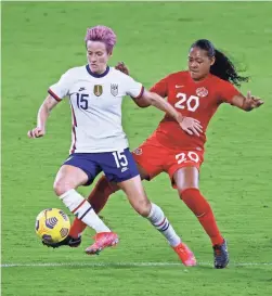  ?? REINHOLD MATAY/USA TODAY SPORTS ?? United States forward Megan Rapinoe, left, and Canada defender Jayde Riviere battle for the ball during a match Feb. 18.