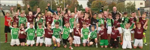  ??  ?? Two Gorey primary schools, Loreto and St. Patrick’s, who came together for a recent game in the Rackard League Rising Stars football competitio­n, with teachers Kevin Nimmo, Alan Cowman and Pádraig Cronin plus referee Eddie O’Sullivan.