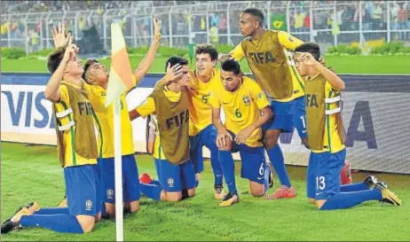  ?? PTI ?? Brazilians celebrate after Weverson (No. 6) scored their first goal against Germany in Kolkata.