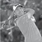  ?? RAJ MEHTA/GETTY IMAGES ?? Justin Lower plays his tee shot on the 14th hole Thursday in the Texas Open.