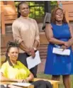  ?? MICKEY WELSH/THE MONTGOMERY ADVERTISER VIA AP ?? From left, Dr. Stephanie Mitchell, Dr. Yashica Robinson and Dr. Heather Skanes listen to midwives and doctors announce a lawsuit at a Tuesday news conference at the Mothers of Gynecology Monument in Montgomery, Ala.