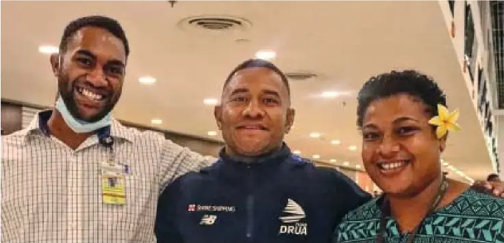  ?? Photo: Waisea Nasokia ?? Swire Shipping Fijian Drua utility back Teti Tela (middle) with fans at Nadi Internatio­nal Airport on March 2, 2023. Tela has been named on the bench in tomorrow’s match against Waratahs.