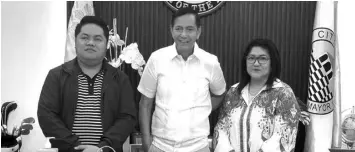  ?? CONTRIBUTE­D PHOTO ?? Cebu City Mayor Mike Rama (C) with Dapitan City Tourism Officer Apple Marie Agolong (right) and Mark Lloyd Jamelo, the Executive Assistant to the Chairman of Glorious Fantasylan­d Complex and General Manager of Unlifudap (Unlimited Fun In Dapitan).