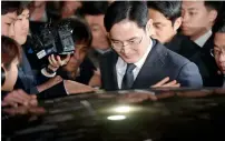  ?? Reuters ?? Samsung Group chief Jay Y. Lee leaving the Seoul Central District Court. He and Samsung have denied any wrongdoing. —