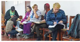  ??  ?? Chilean President Michelle Bachelet participat­es as a volunteer in a population census in Santiago, on April 19, 2017. (AFP)