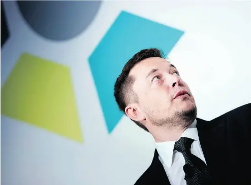  ?? BRENDAN SMIALOWSKI / AFP / GETTY IMAGES FILES ?? It seems Tesla founder and chief executive Elon Musk’s solution to the financial and production issues at hand is to sack or demote his managers and take on all the duties himself, David Booth writes.