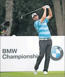  ?? [AP PHOTO/CHARLES REX ARBOGAST] ?? Marc Leishman watches his tee shot on the second hole during the final round of the BMW Championsh­ip Sunday in Lake Forest, Ill.