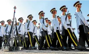  ?? ?? Serving the nation: Part of the procession during the annual Parade of rmc cadets at Perdana camp Sungai Besi, Kuala Lumpur. — Bernama