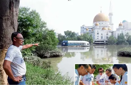  ??  ?? Extra help: Ng showing the trash intercepto­r in Sungai Klang to remove floating rubbish in the river. (Inset) Ng (third from right) with fellow participan­ts learning how to make mud balls to be used for river cleaning.