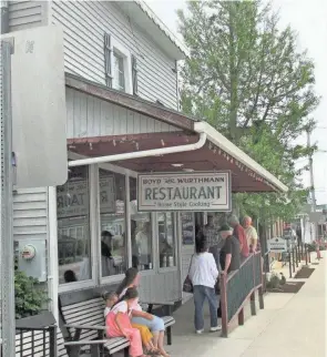  ?? KEVIN LYNCH PHOTOS/WOOSTER DAILY RECORD ?? Hungry visitors to Holmes County don‘t mind waiting in line to dine at Ohio’s No. 1 rated diner by Food & Wine Magazine, Boyd & Wurthmann Restaurant in Berlin.