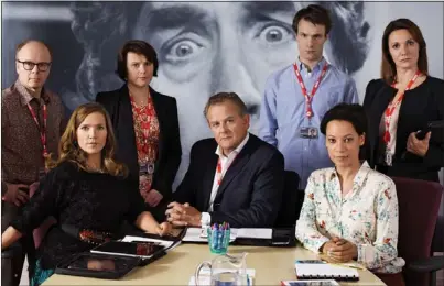  ??  ?? EXECUTIVE DECISION: Hugh Bonneville, centre, as BBC official Ian Fletcher in the forthcomin­g comedy W1A