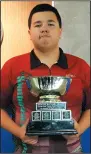  ?? SUBMITTED PHOTOS ?? Jaliah Kochie smiles after winning the main event at a youth darts tournament in Medicine Hat Saturday. Right: Mykel Kequahtoow­ay poses after winning the Silver Cup event at the Royal Canadian Legion in Medicine Hat Sunday.