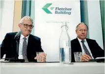  ?? PHOTO: DAVID WHITE/STUFF ?? Incoming CEO Ross Taylor, left, and outgoing chairman Sir Ralph Norris fronted to media over Fletcher Building’s losses in February.