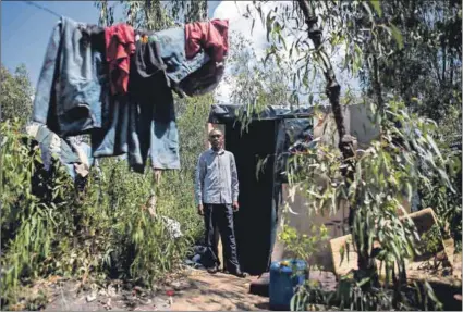  ??  ?? Is this freedom? Zakhe Majozi has been homeless since 2006. After years of having ‘cardboard and plastic as my home’, Majozi now lives in a two-roomed shack, with ‘about six or seven others’. Photo: Oupa Nkosi