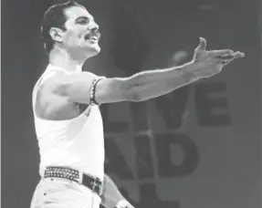 ?? MARK ALLAN/AP ?? The real Freddie Mercury made music history with Queen at the band’s Live Aid performanc­e on July 13, 1985, at Wembley Stadium in London.