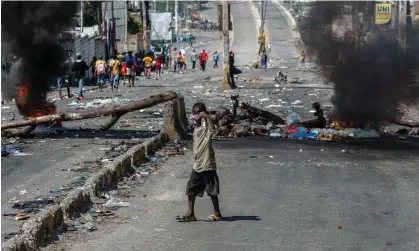  ?? Photograph: Johnson Sabin/ EPA ?? ‘Interventi­on hollows out the state, kneecaps Haiti’s chances for democracy and legalizes official impunity’
