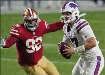  ?? ROSS D. FRANKLIN — THE ASSOCIATED PRESS ?? Bills quarterbac­k Josh Allen ( 17) scrambles as 49ers defensive end Kerry Hyder ( 92) pursues during the first half on Monday night in Glendale, Ariz.