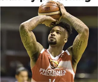  ?? ALVIN S. GO ?? EUGENE PHELPS led the Phoenix Fuel Masters to a 113-107 victory over the Columbian Dyip on Wednesday.