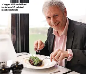  ?? ?? > Vegan William Telford tucks into 3D printed meat substitute