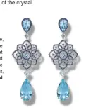  ??  ?? Aquamarine, sapphire and 18 karat white gold earrings, price upon request, Chopard