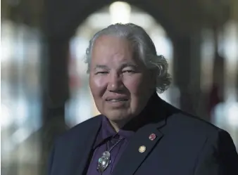  ?? CP FILE PHOTO ?? Sen. Murray Sinclair poses for a photo outside his Senate office on Parliament Hill, in Ottawa in 2016. He says a proposal by Alberta United Conservati­ve leader Jason Kenney to provide legal support for pro-pipeline First Nations is typical of the divideand-conquer tactics used to promote division amongst Indigenous people.