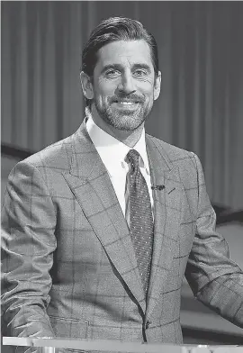  ?? PHOTOS PROVIDED BY JEOPARDY PRODUCTION­S ?? NFL MVP and former “Celebrity Jeopardy!” winner Aaron Rodgers was a surprise as guest host in April.