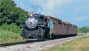  ?? ADRIAN BRODIE ?? US Sugar Corporatio­n 4-6-2 No. 148 approaches San Luis Avenue, Clewiston, while ceremonial­ly hauling the final sugar cane train of the season to the processing plant on May 31.