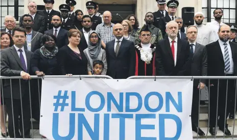  ?? EPA ?? Home Secretary Sajid Javid, centre, at a service held on the first anniversar­y of the mosque attack in which Makram Ali died. Opposition leader Jeremy Corbyn, third right, and Mayor of London Sadiq Khan, behind Mr Corbyn, were among the attendees