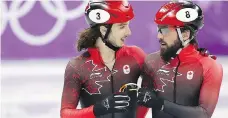  ?? LEAH HENNEL ?? Samuel Girard and Charles Hamelin, after winning bronze in the men’s 5,000 metres in Pyeongchan­g.