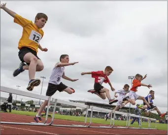  ?? Pics: ?? Hurdles action from the IT Sligo track during the Sligo Community Games. Donal Hackett.