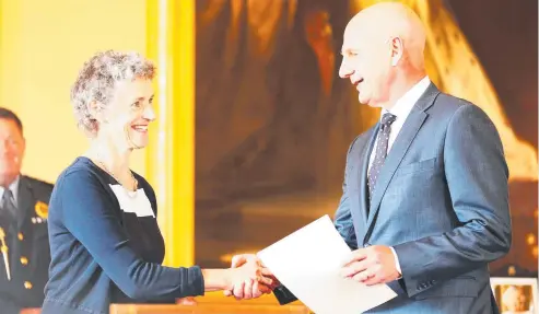  ??  ?? New Tasmanian Premier Peter Gutwein alongside Tasmanian Governor Kate Warner as he is sworn in.
Picture: ZAK SIMMONDS