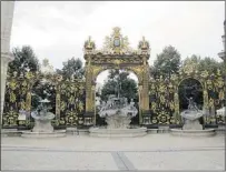  ??  ?? One of the extraordin­ary gates that grace corners of Nancy’s Place Stanislas.