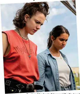  ?? ?? Car trouble: Jamie (Margaret Qualley) and Marian (Geraldine Viswanatha­n) in Drive-Away Dolls