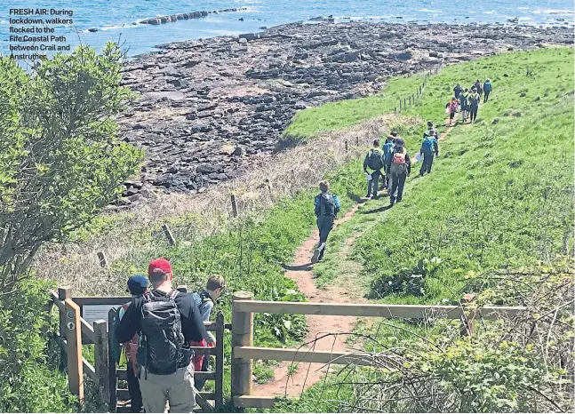  ??  ?? FRESH AIR: During lockdown, walkers flocked to the Fife Coastal Path between Crail and Anstruther.