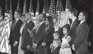  ?? WASHINGTON
-AP ?? US President Donald Trump, first lady Melania Trump and their extended family watch Trump campaign fireworks explode behind the Washington Monument from the South Lawn of the White House after his acceptance speech as the 2020 Republican presidenti­al nominee during the final event of the Republican National Convention in Washington, US.