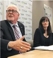  ??  ?? Dr. Perry Kendall, provincial health officer, left, and Dr. Patricia Daly, chief medical officer with Vancouver Coastal Health, speak to the media on Thursday.