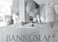  ??  ?? Based on its calculatio­ns, the research arm of AmInvestme­nt Bank Bhd noted that an interest rate increase could boost banks’ net profits by 0.9 per cent to 2.4 per cent.