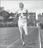  ?? Associated Press ?? ROGER BANNISTER covers a mile in 3 minutes 59.4 seconds on May 6, 1954, at Oxford, England.