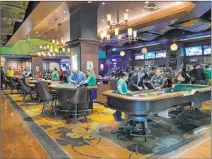  ?? K.M. Cannon Las Vegas Review-journal @Kmcannonph­oto ?? Gaming tables find few takers at O’sheas Casino at The Linq Hotel.