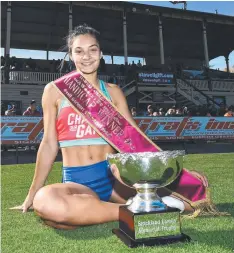  ??  ?? Alexia Loizou celebrates her Stawell Gift win. Picture: AAP